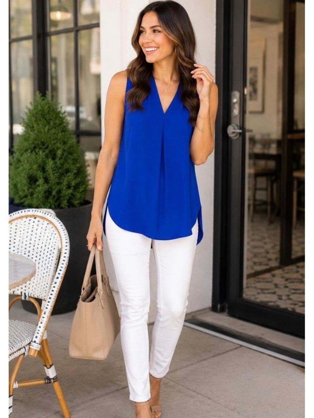Women's Vince Camuto royal blue sleeveless blouse with a deep V-neckline S SMALL